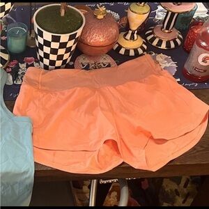 LULULEMON Speed Up Mid-Rise Lined SHORTS  4" sunny coral Sz 6